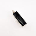 Black rectangular pendant with silver accents on a white background